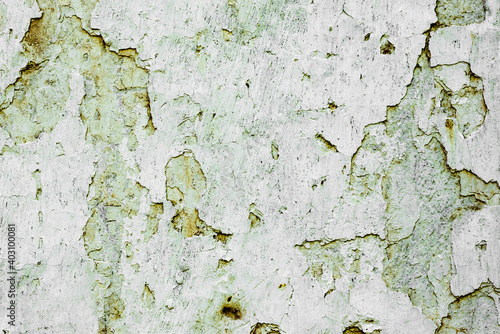 Texture of a concrete wall with cracks and scratches which can be used as a background