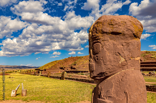 Bolivia. Tiwanaku (or Tiahuanaco) - Pre-Columbian ancient and sacred site on a list of the UNESCO World Heritage Site. Statue 'el Fraile' (the monk) and platform of Kalasasaya (temple) photo