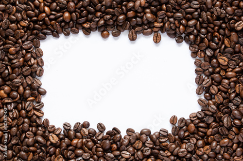 brown roasted coffee beans frame on white background