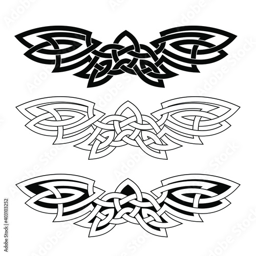 Ornament in the form of outstretched wings in the Celtic national style isolated on a white background.