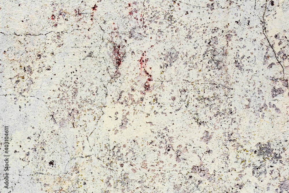 Texture of a concrete wall with cracks and scratches which can be used as a background Texture of a concrete wall with cracks and scratches which can be used as a background