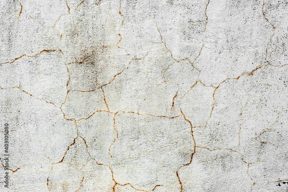 Obraz premium Texture of a concrete wall with cracks and scratches which can be used as a background