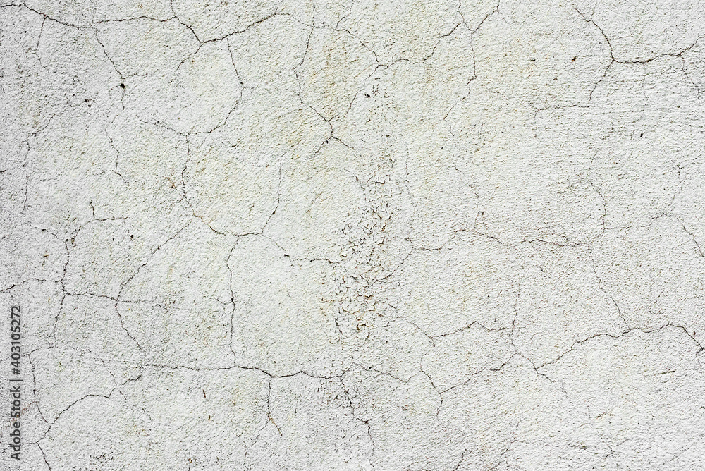 Obraz premium Texture of a concrete wall with cracks and scratches which can be used as a background