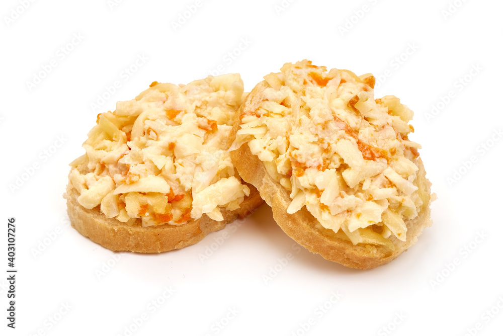 Snack with cheese, eggs and carrot filling, isolated on white background Snack with cheese, eggs and carrot filling, isolated on white background