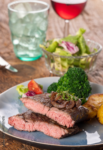 halves of a steak on a plate