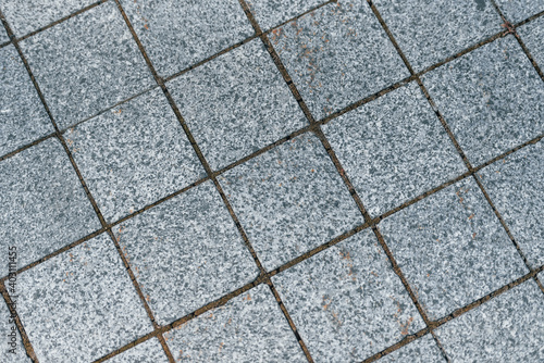 Textured background. Close uo detailed view of graphite urban floor