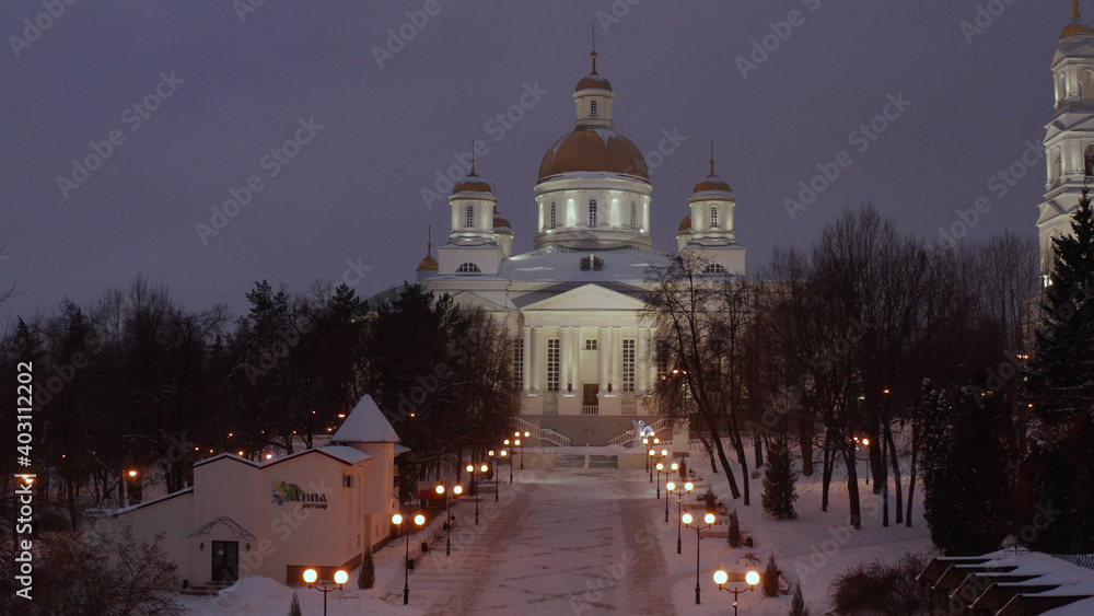 New Cathedral in Penza. Winter panorama of the city of Penza with the Orthodox cathedral in the foreground and residential areas, river and highway on a sunny day, top view, Russia. Church in Russia.