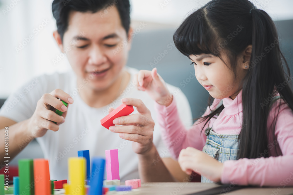 little children playing toys to education with family at home, girl happy and fun in childhood concept little children playing toys to education with family at home, girl happy and fun in childhood concept