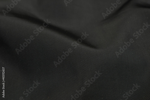 black crinkle cotton fabric with visible details. background