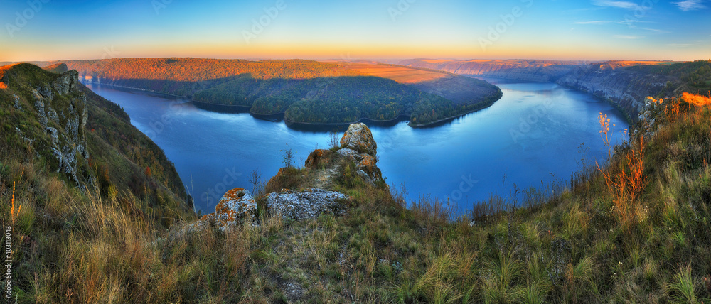 Beautiful autumn landscape at sunrise. picturesque river canyon