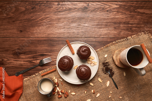 chocolate dessert with coffee and almond milk on a wooden table