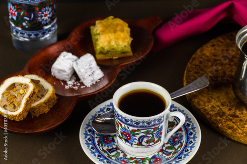 Turkish coffee with baclava and delight.