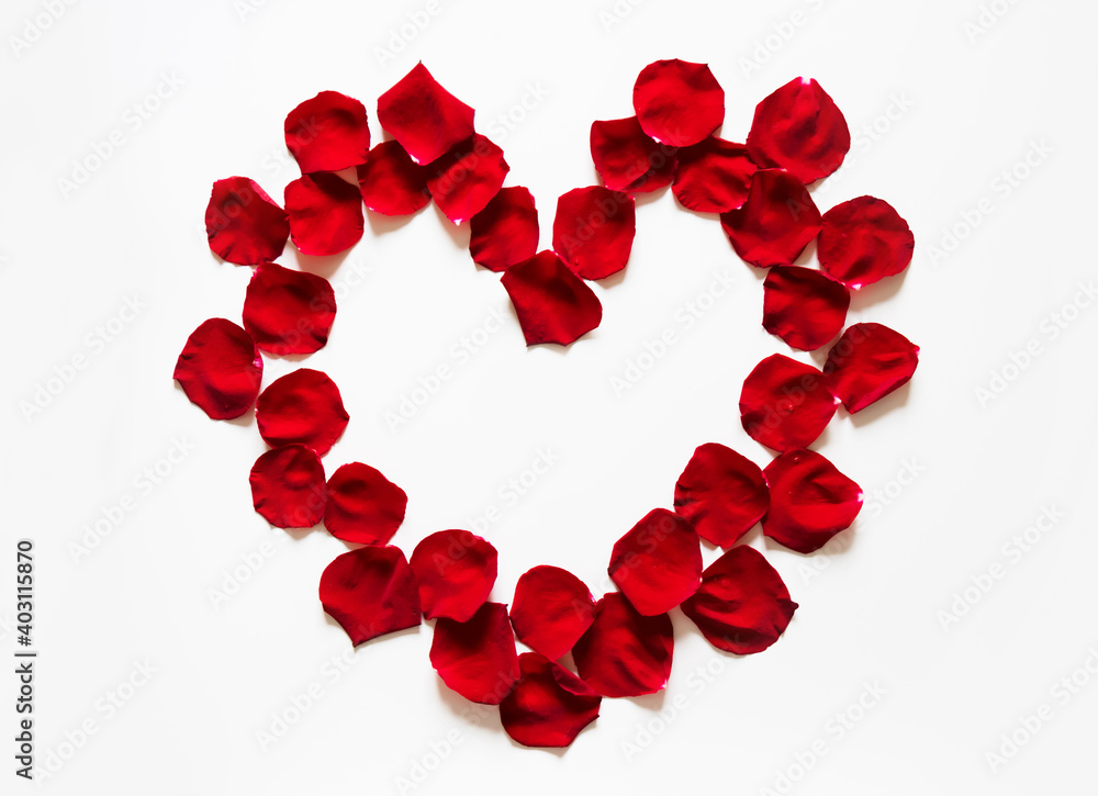 Heart of red rose flower petals on white background Heart of red rose flower petals on white background