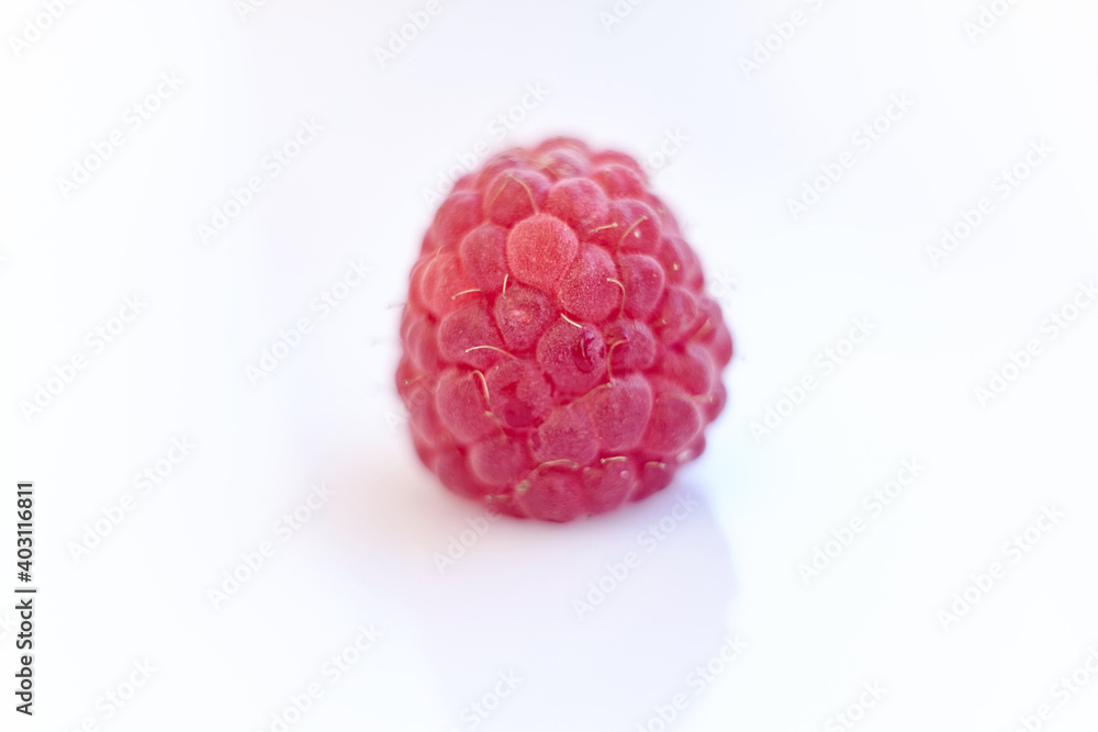 Raspberry isolated on white background. Vegan food, detox concept Raspberry isolated on white background. Vegan food, detox concept