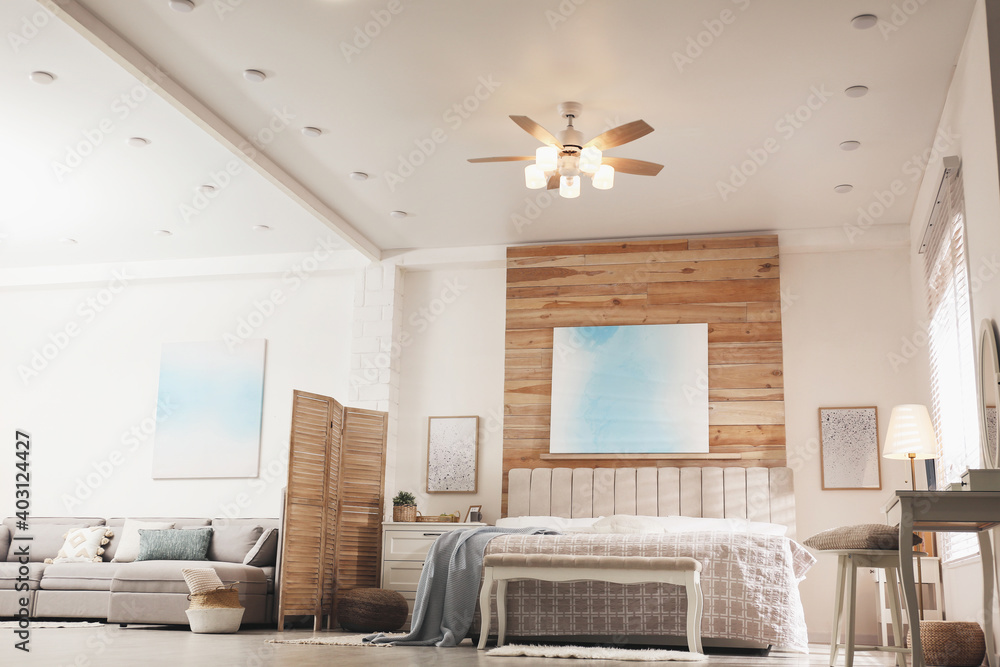 Stylish apartment interior with modern ceiling fan, low angle view - obrazy, fototapety, plakaty 