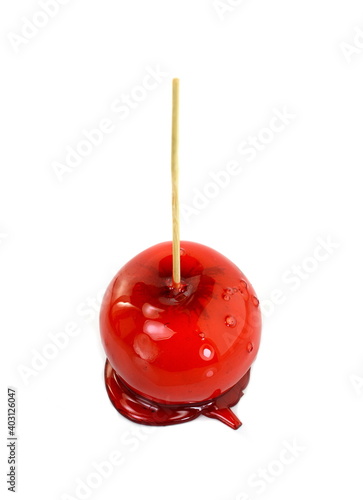 Toffee apple isolated on white background.