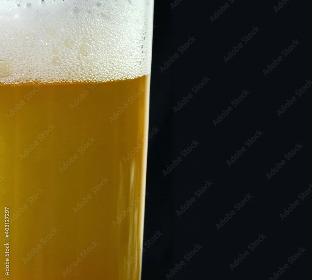 Glass of Light wheat Beer isolated on black background Glass of Light wheat Beer isolated on black background