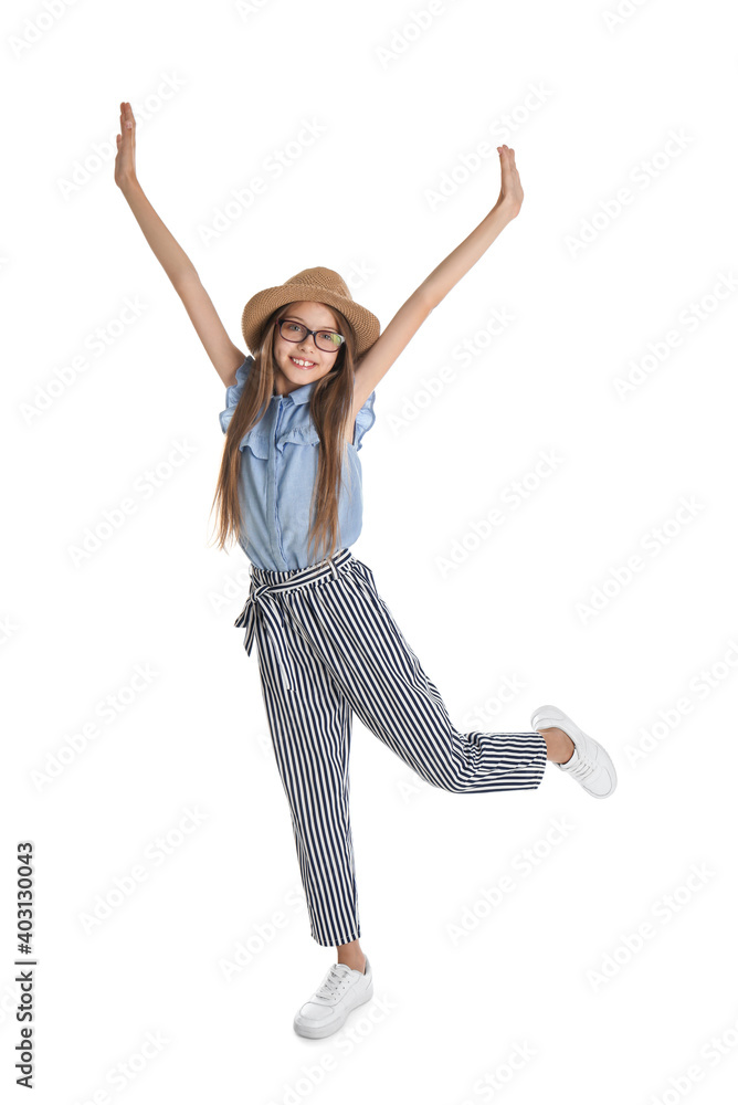 Full length portrait of active little girl on white background