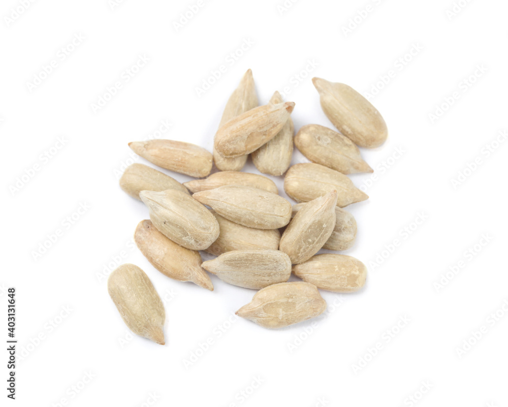 Peeled sunflower seeds on white background, top view