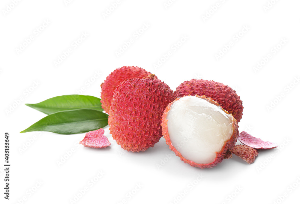 Fresh ripe lychees with green leaves on white background Fresh ripe lychees with green leaves on white background