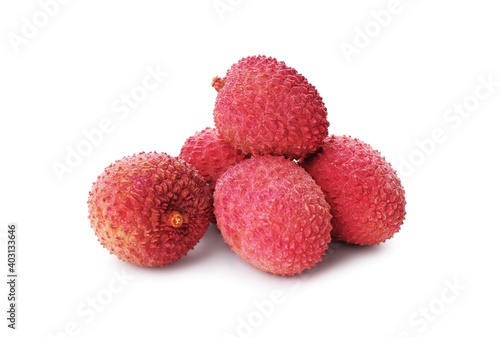 Pile of fresh ripe lychees on white background
