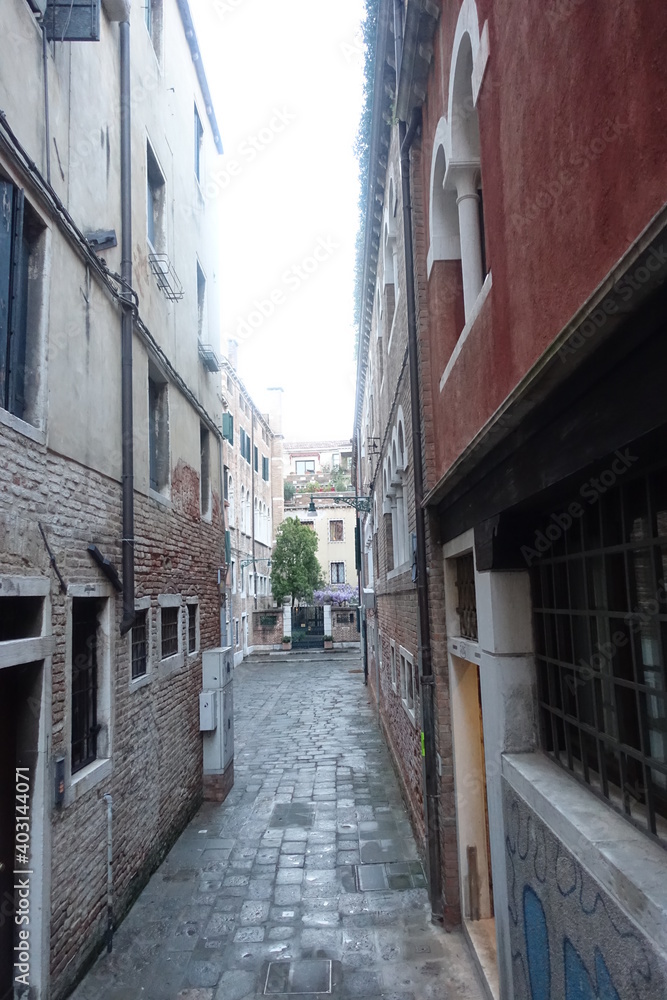 Canal and buildings photo taken in Venice, Italy