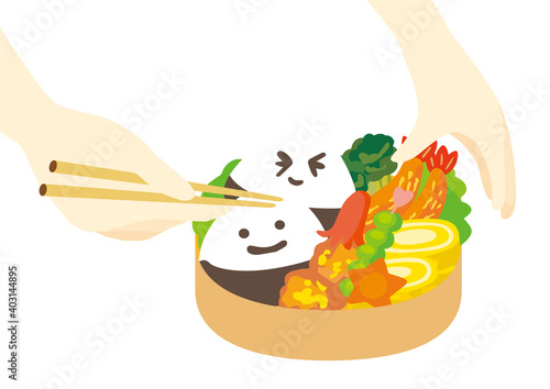 箸を使ってお弁当を作る手　キャラ弁