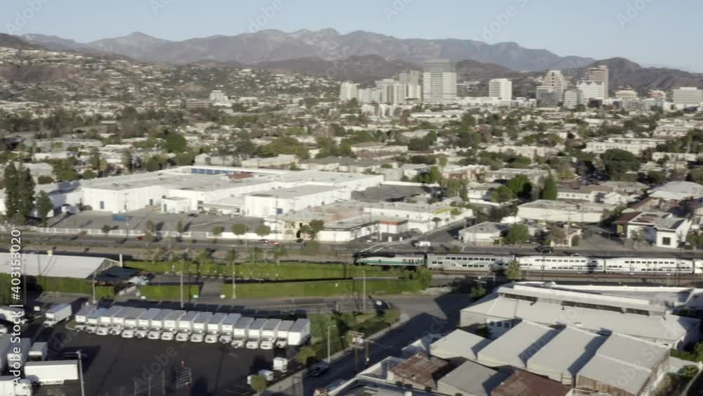 Los Angeles Metro link train, aerial view moving through Glendale, day time Los Angeles Metro link train, aerial view moving through Glendale, day time