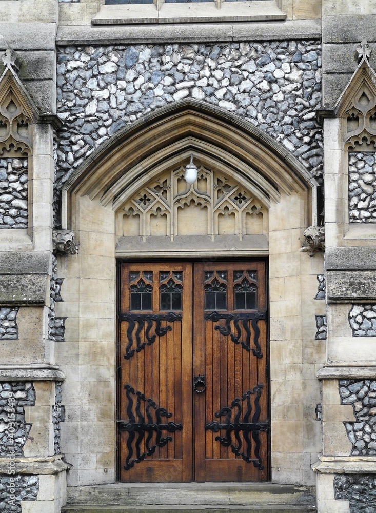 Old wooden door in a church in Cambridge