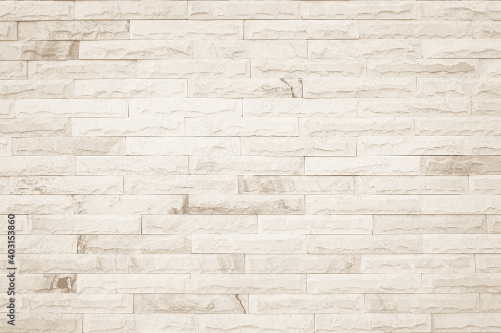 Fototapeta premium Empty Background of wide cream brick wall texture. Old brown brick wall concrete or stone pattern nature, wallpaper limestone abstract floor/Grid uneven interior rock. Home & office design backdrop.