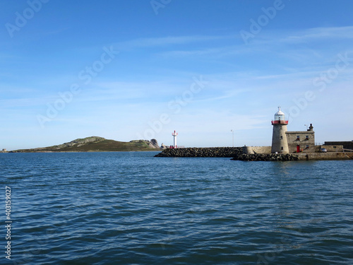 View of the "Ireland's Eye" Island from West Pier of Howth, which is a small uninhabited island situated north of Howth Harbour in Ireland near Dublin
