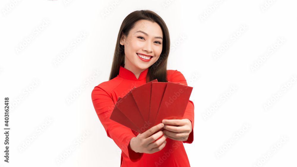 Lunar New Year celebrations, Portrait of Vietnamese woman dress in Ao Dai (vietnam traditional dress) Lunar New Year celebrations, Portrait of Vietnamese woman dress in Ao Dai (vietnam traditional dress)