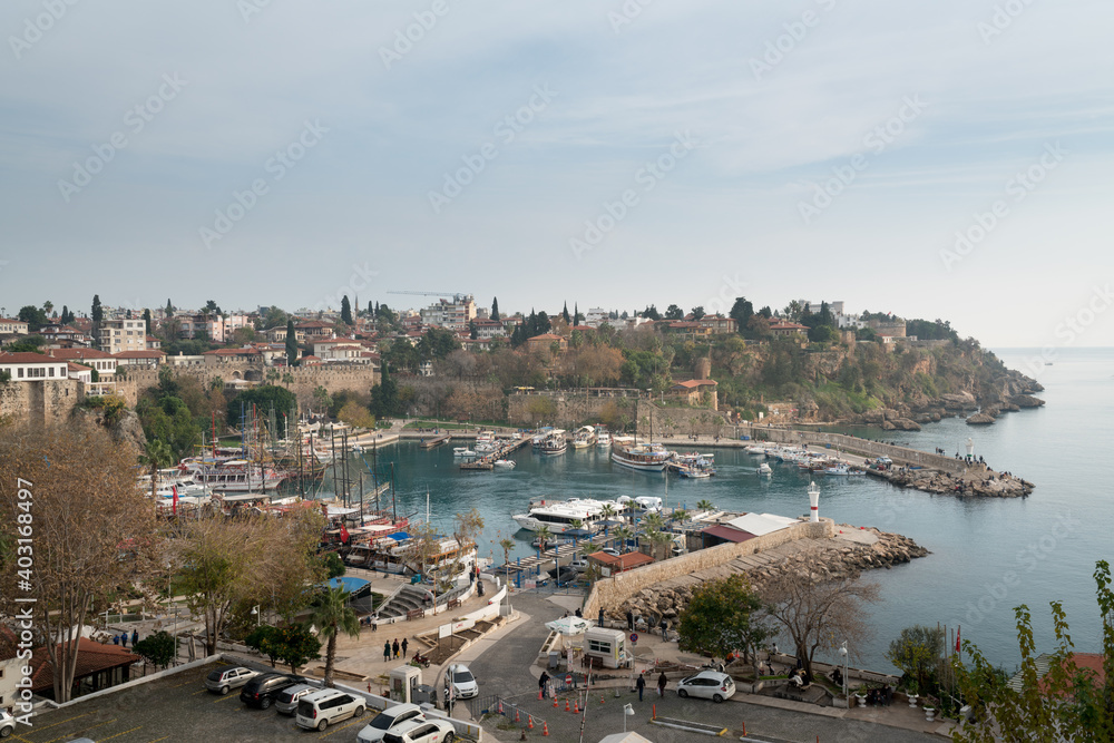 Yacht marina. The beautiful View of the city, yachts and marina in Antalya. Antalya is popular tourist destination in Turkey is a district on the Mediterranean coast.  