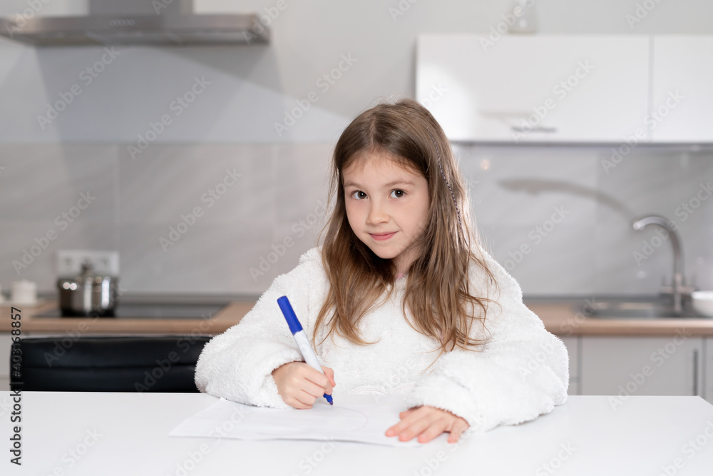 Cute little girl in headphones watching a video tutorial on drawing in an album, little preschooler draws pictures, child learns online at home, Cute little girl in headphones watching a video tutorial on drawing in an album, little preschooler draws pictures, child learns online at home,
