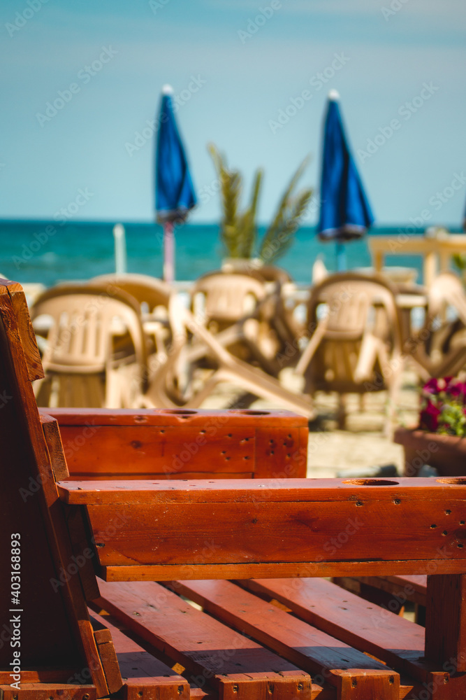 Obraz premium table and chairs on the beach
