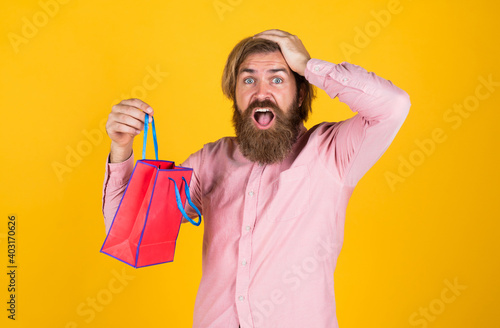 Obraz na plátně brutal caucasian hipster with gift