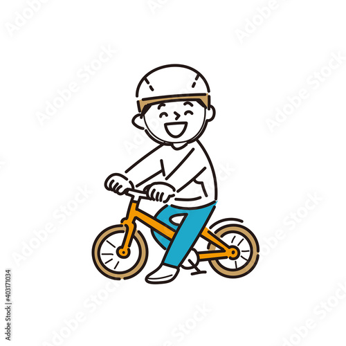 自転車に乗って楽しむ男の子