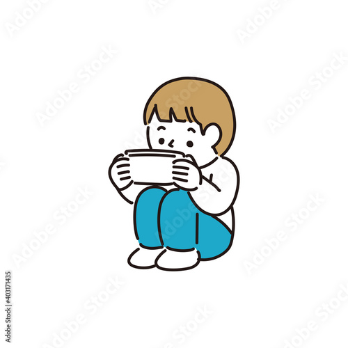 ゲームに夢中になる男の子