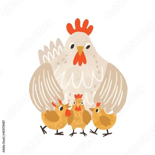 Cute clocking hen standing with yellow chicken and covering them with wings. ...