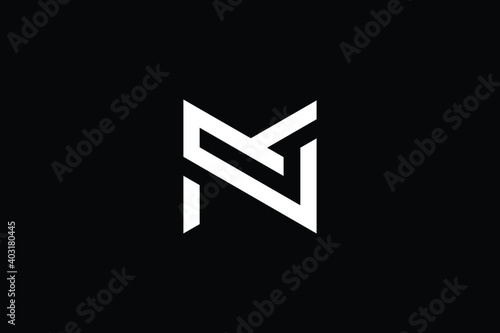 NM logo letter design on luxury background. MN logo monogram initials letter concept. NM icon logo design. MN elegant and Professional letter icon design on black background. M N NM MN