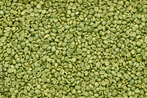 Green coffee beans top view background