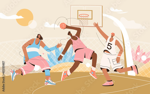 Basketball team in uniform playing streetball on playground