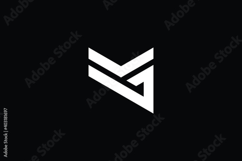 MG logo letter design on luxury background. GM logo monogram initials letter concept. MG icon logo design. GM elegant and Professional letter icon design on black background. M G GM MG