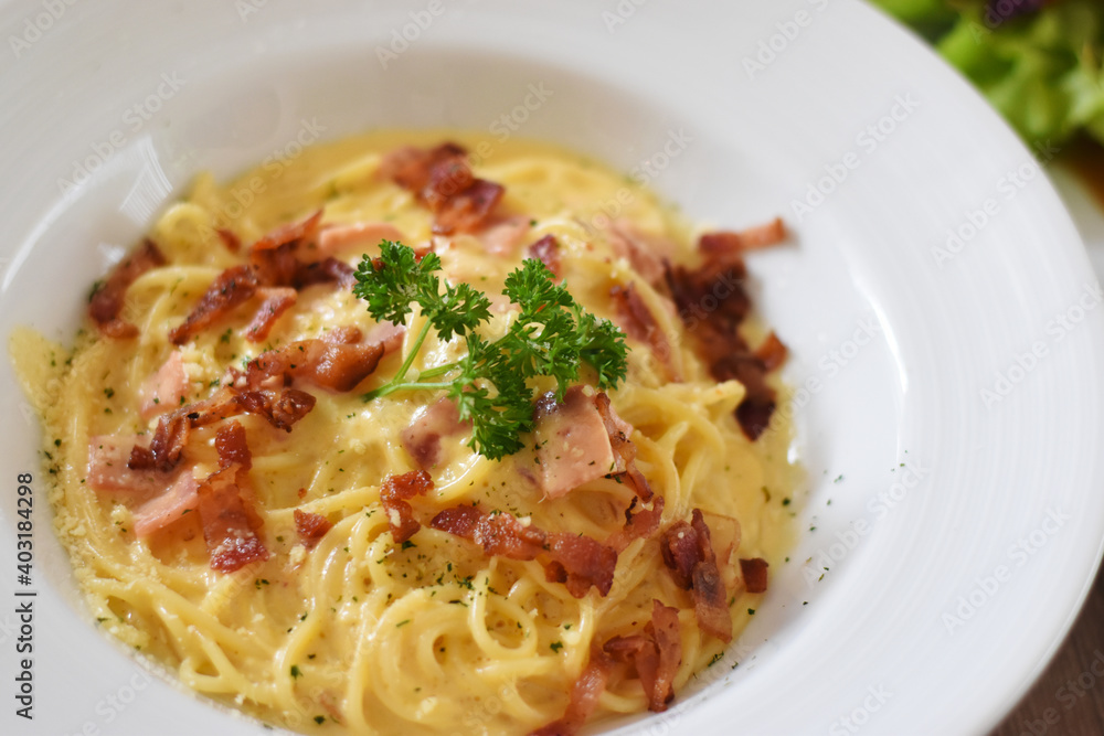 Soft focus Carbonara spaghetti in white plate Soft focus Carbonara spaghetti in white plate