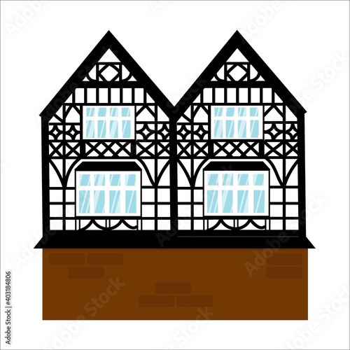 Old german house with black wooden beams. Windows with glare. Colored half timbered building. Flat facades of european framing houses, cottages