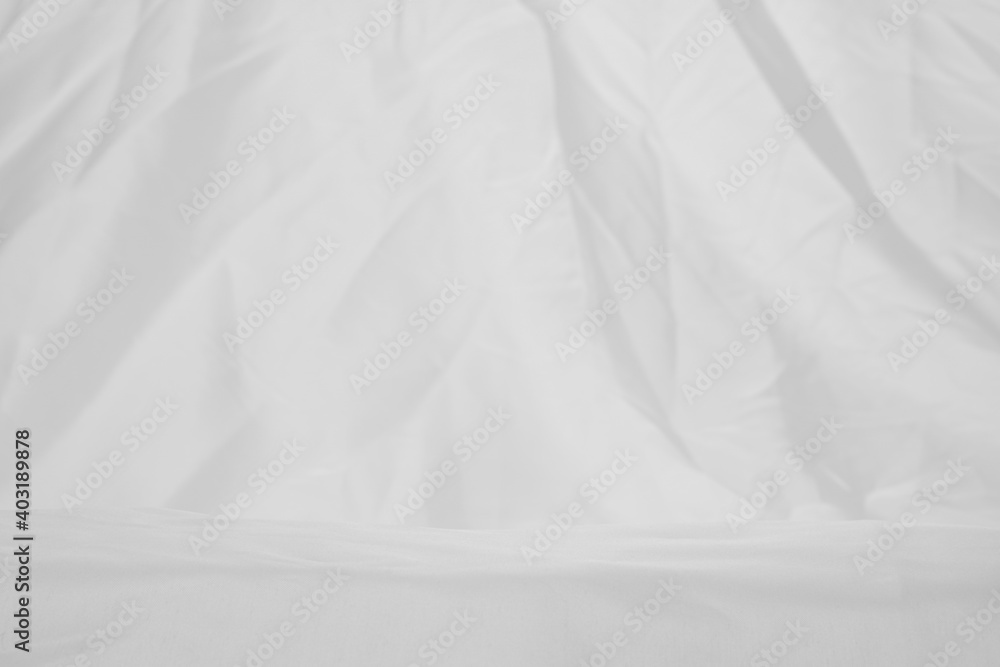 A Textile Ledge for a Product Display, Showing Close Detail to the Synthetic Fabric with a Narrow Continuous Pattern. A Textile Ledge for a Product Display, Showing Close Detail to the Synthetic Fabric with a Narrow Continuous Pattern.