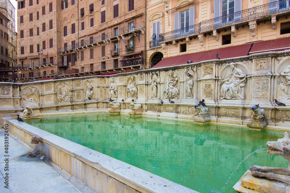 Fonte Gaia fountain in Piazza Del Campo square, historic center of Siena, Tuscany region, Italy. Local Italian landmark built in 1419