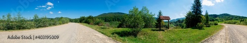 Wooden bench near the alpine road in the Carpathians