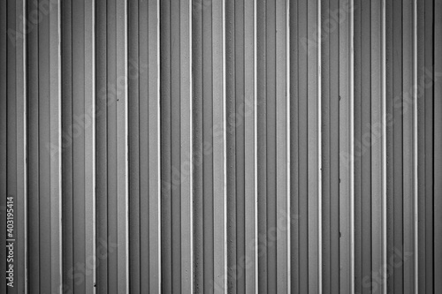 Grey metal plate fence background