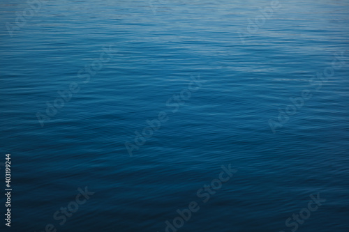 Fototapeta Naklejka Na Ścianę i Meble -  Smooth of beautiful blue sea water with fine ripples, surface and abstract natural background